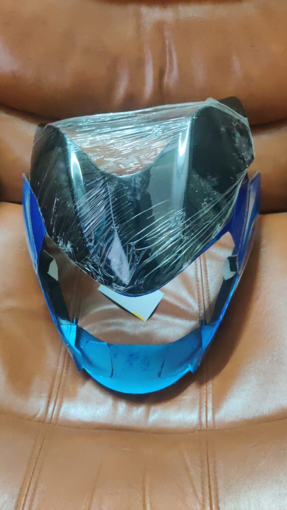 bajaj xcd 135 headlight visor front view showing durable fiber construction