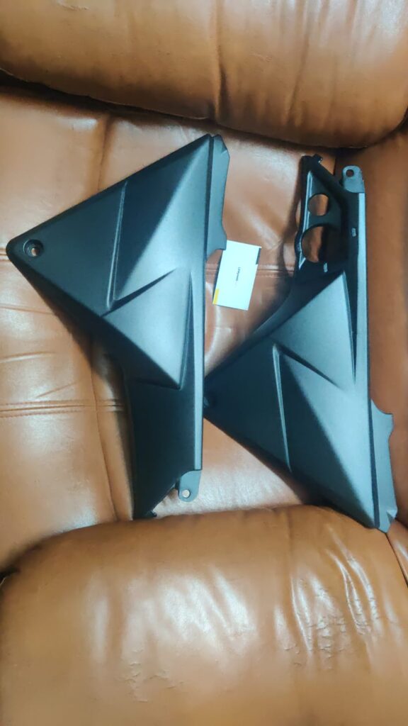 Honda twister side panel matte black installed on a motorcycle