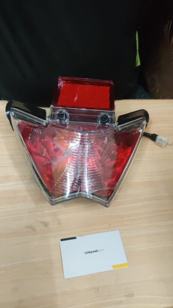 honda unicorn tail light assembly in durable fiber finish