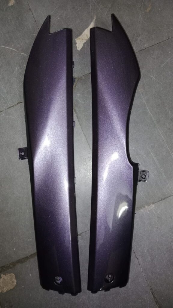 Activa i purple foot trim side panel installed on scooter