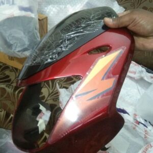 Bajaj Caliber Croma Visor in red color made from ABS plastic