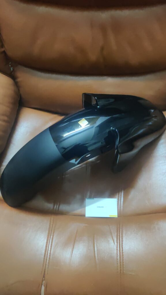 bajaj discover 100 front mudguard displayed in durable fiber finish
