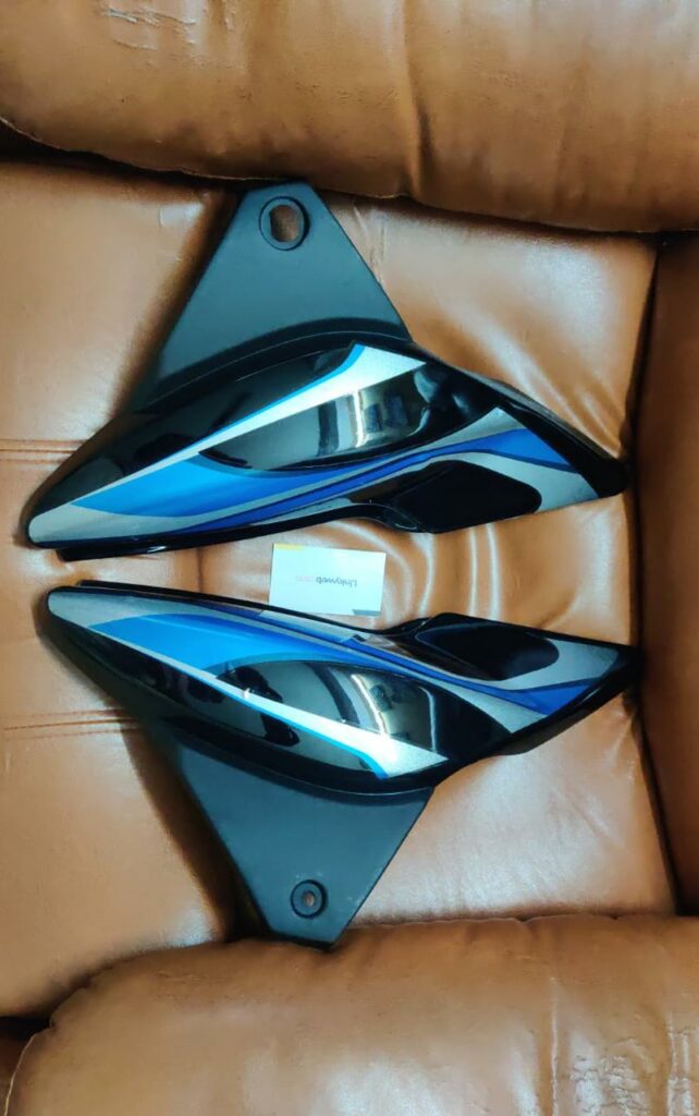 Bajaj discover side panel in black grey finish ready for installation