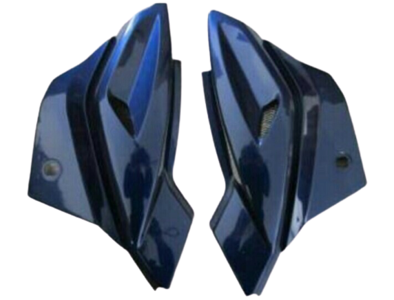 Close-up of a painted bajaj pulsar 180 side panel showing high grade plastic finish
