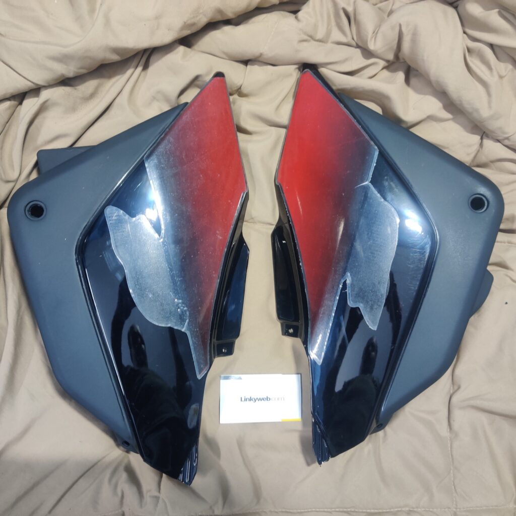 Hero Ambition 135 Side Panel Black resting on a clean surface