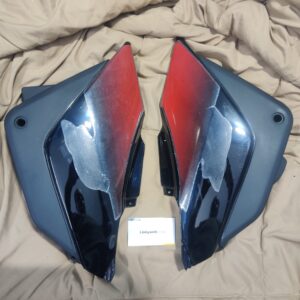 Hero Ambition 135 Side Panel Black resting on a clean surface