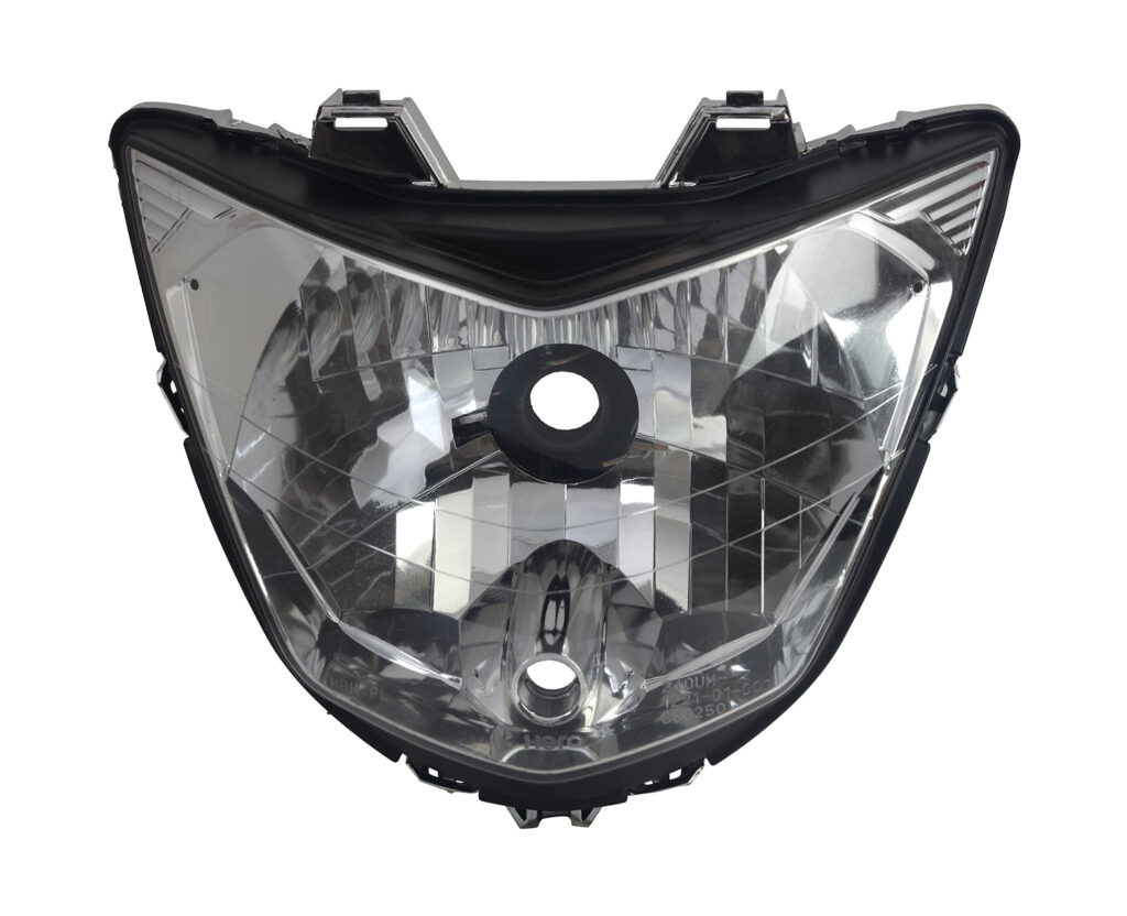 Hero glamour headlight assembly showing front housing and mounting points for motorcycle