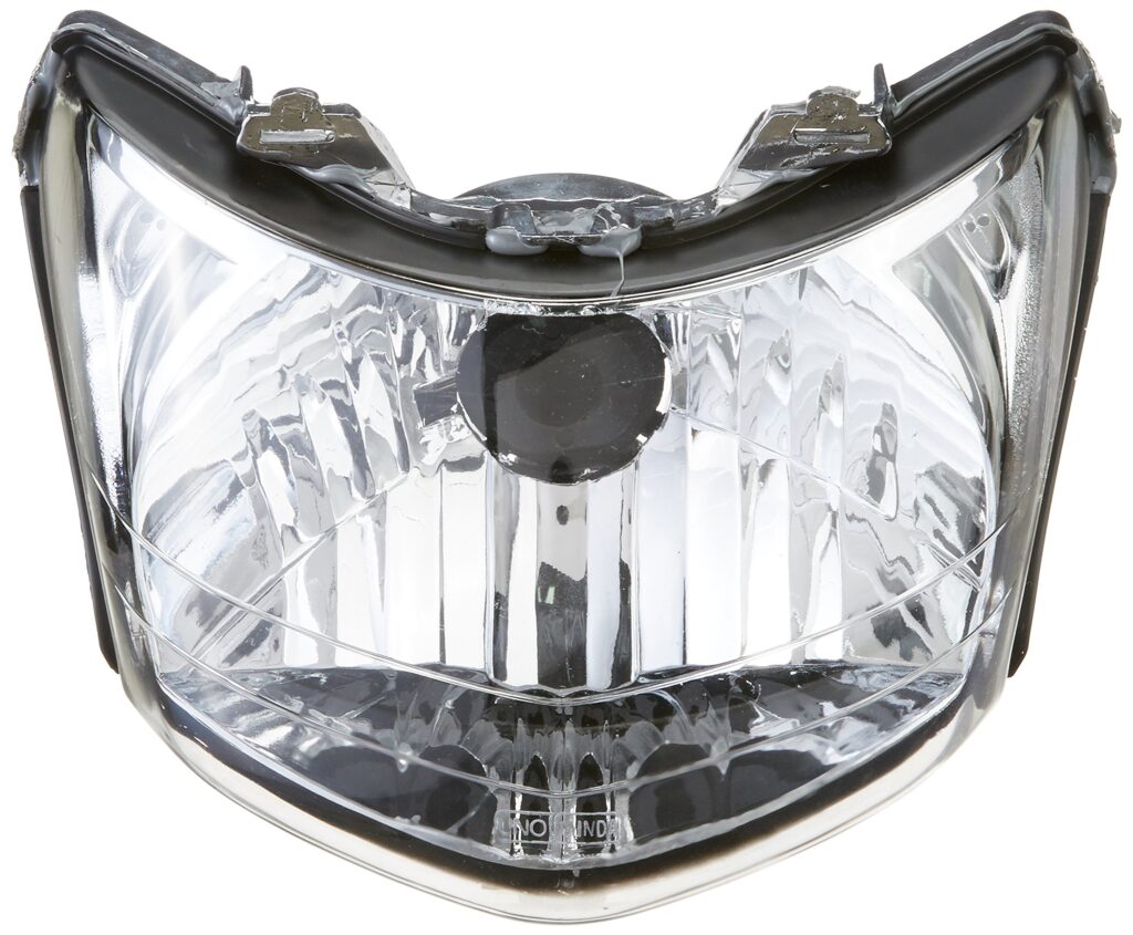 Hero hf deluxe headlight unit shown clearly against a neutral background