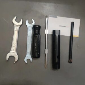Hero hf deluxe tool kit displayed in a compact storage case with essential maintenance tools
