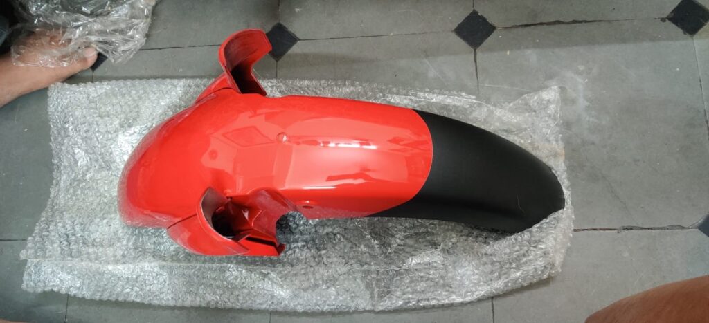 Hero Hunk Red Front Mudguard 3pc replacement part viewed from the front