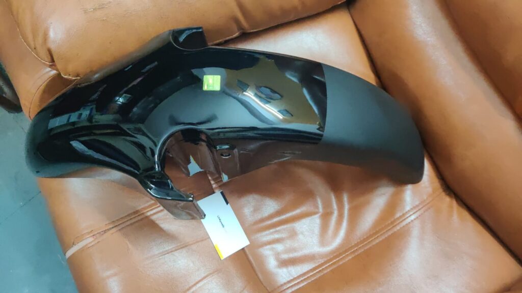 Hero Karizma Front Mudguard made from durable fiber material in multiple colours
