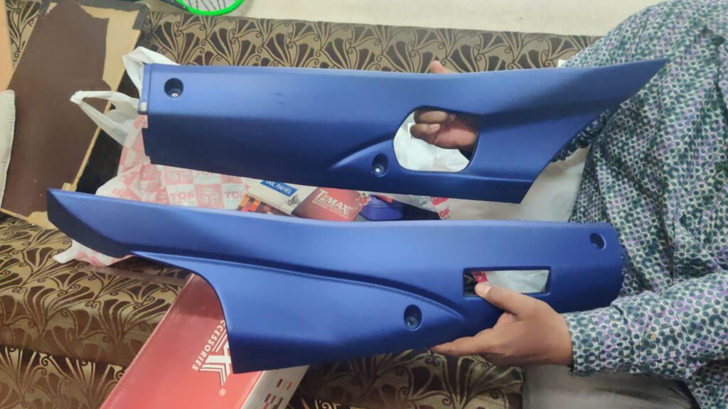 Hero maestro edge foot guard trim in blue color mounted on a scooter