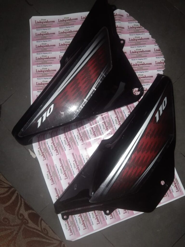 Honda Dream Neo side panel in black and red finish with matching sticker