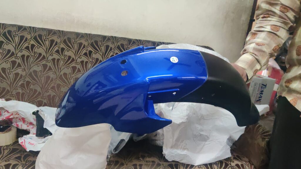 honda shine blue front mudguard made of durable fiber material