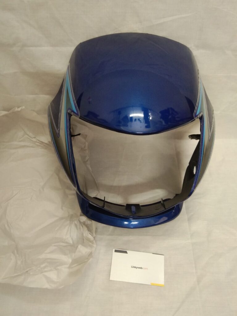 Front view of a black, blue, and silver honda shine visor mask fairing