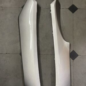Suzuki Access silver foot trim viewed from an angle showcasing its finish