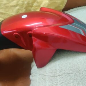 tvs apache front mudguard red mounted on a motorcycle