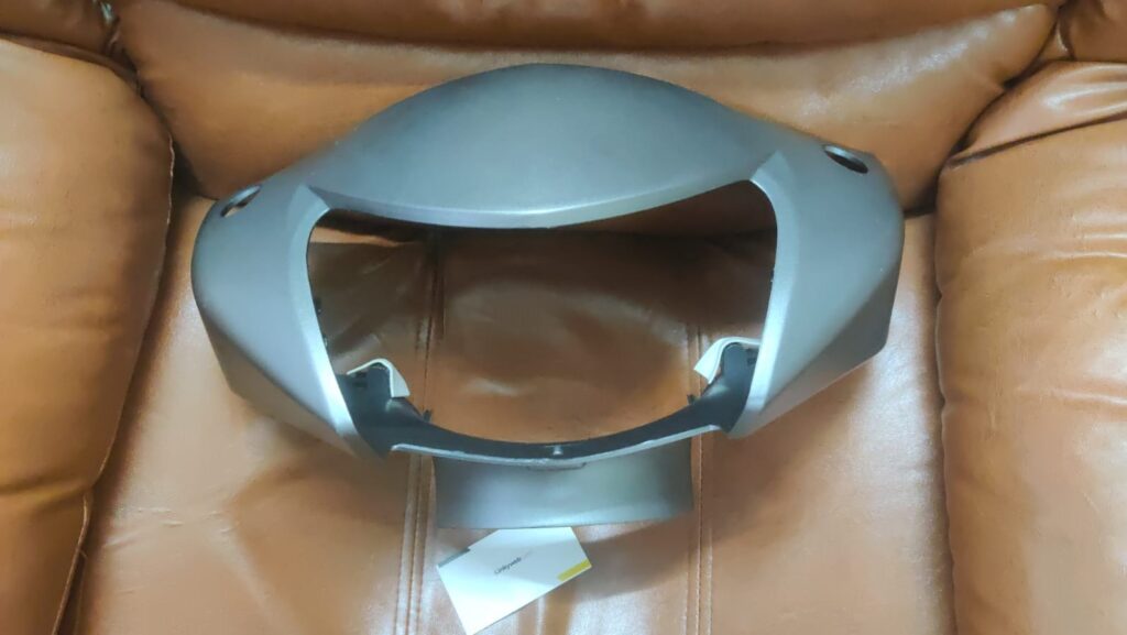 Tvs jupiter headlight visor in matte grey fiber finish