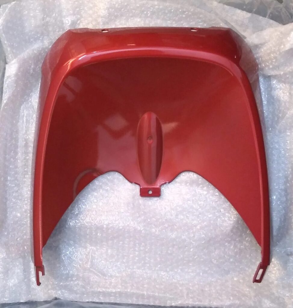 tvs jupiter red lower body panel displayed on a clean background