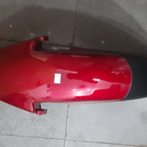 tvs star city front mudguard red installed on a motorcycle