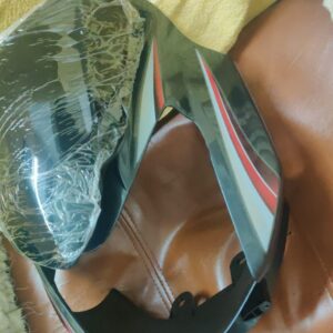 Grey fiber tvs star sport visor for motorcycle headlight protection