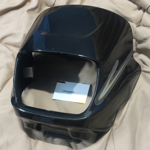 Yamaha Crux R headlight visor black fiber accessory mounted on motorcycle