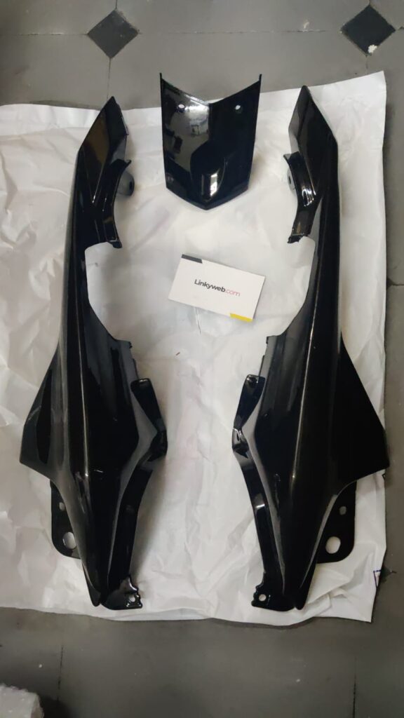 Yamaha FZ fiber tail panel showing smooth paint-ready surface and lightweight build