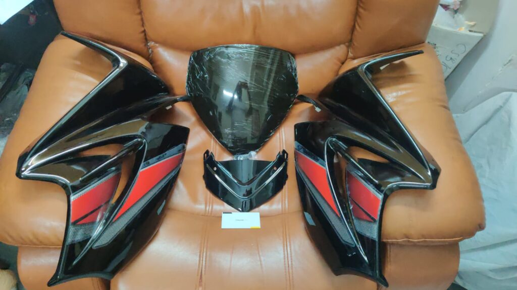 karizma headlight visor mask black fiber front view